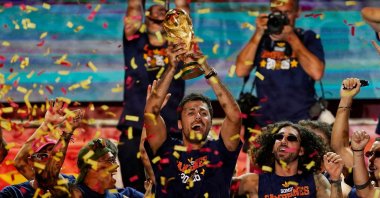 Spain's Rodri celebrates with the World Cup trophy and teammates on stage at Cibeles Square after the victory parade as fans gather to celebrate winning the World Cup, Madrid, Spain, July 20, 2026. (Reuters Photo)