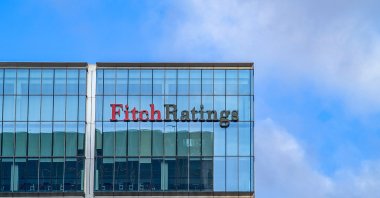 The logo of Fitch Ratings is on the rooftop of its U.K. headquarters in the Canary Wharf financial district, London, United Kingdom, Dec. 26, 2025. (Reuters Photo)