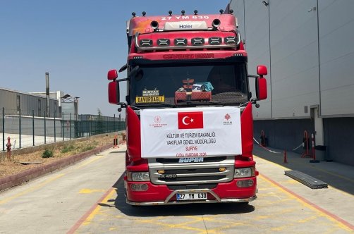 A truck carrying food aid departs for northern Syria, Hatay, Türkiye, July 21, 2026. (IHA Photo) 