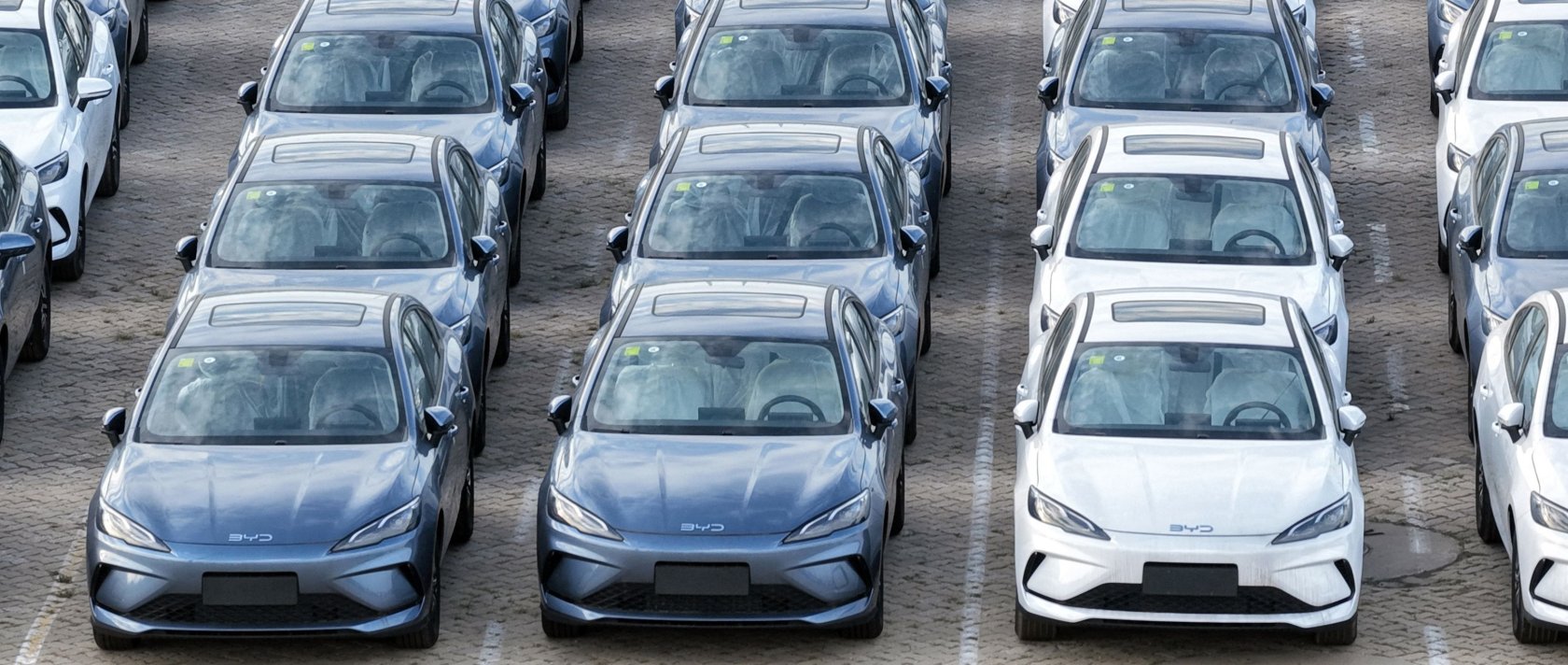 BYD cars are seen at a car storage yard before being loaded onto ships for export, Yantai, China's eastern Shandong province, July 19, 2026. (AFP Photo)