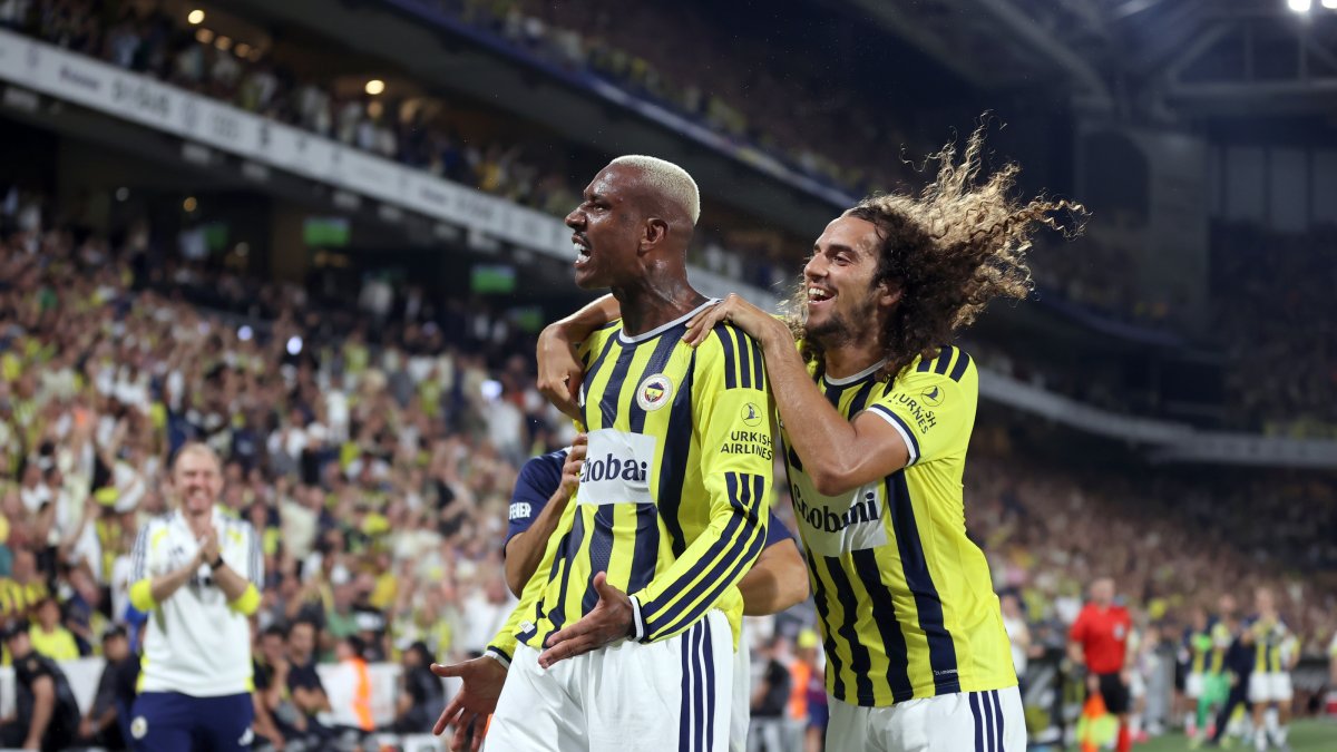 Fenerbahçe's Talisca (L) celebrates with teammate Matteo Guendouzi after scoring during the UEFA Champions League second qualifying round match against Gornik Zabrze at Chobani, Istanbul, Türkiye, July 21, 2026. (AA Photo)