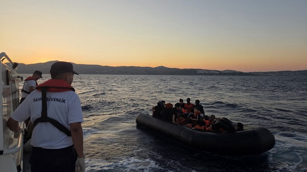 Turkish Coast Guard Command intercepts migrants while attempting to leave the country illegally off the coast of Izmir, Türkiye, July 19, 2026. (AA Photo)