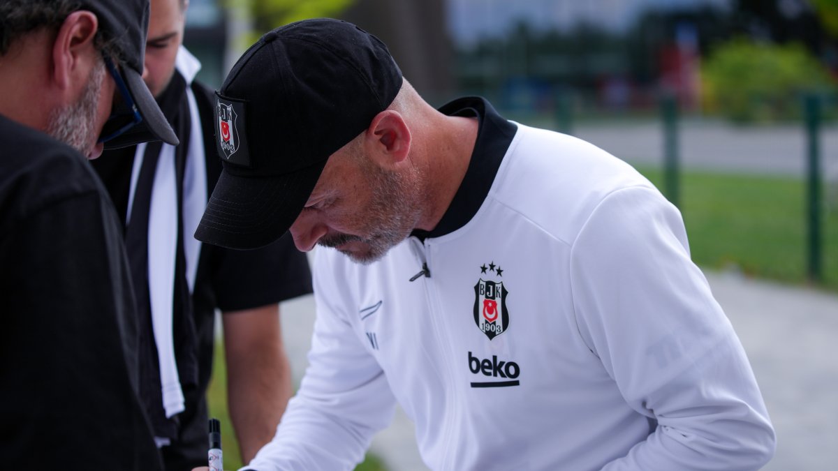 Beşiktaş coach Vincenzo Italiano signs autographs during a training session at the Slovak Olympic Training Centre ahead of the Europa League match against Midtjylland, Samorin, Slovakia, July 22, 2026. (AA Photo)