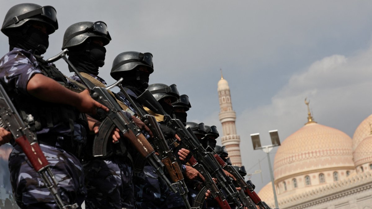 Members of the Houthi security force stand guard as Houthi supporters rally against the Saudi-led coalition in Sanaa, Yemen, July 17, 2026. (Reuters Photo)