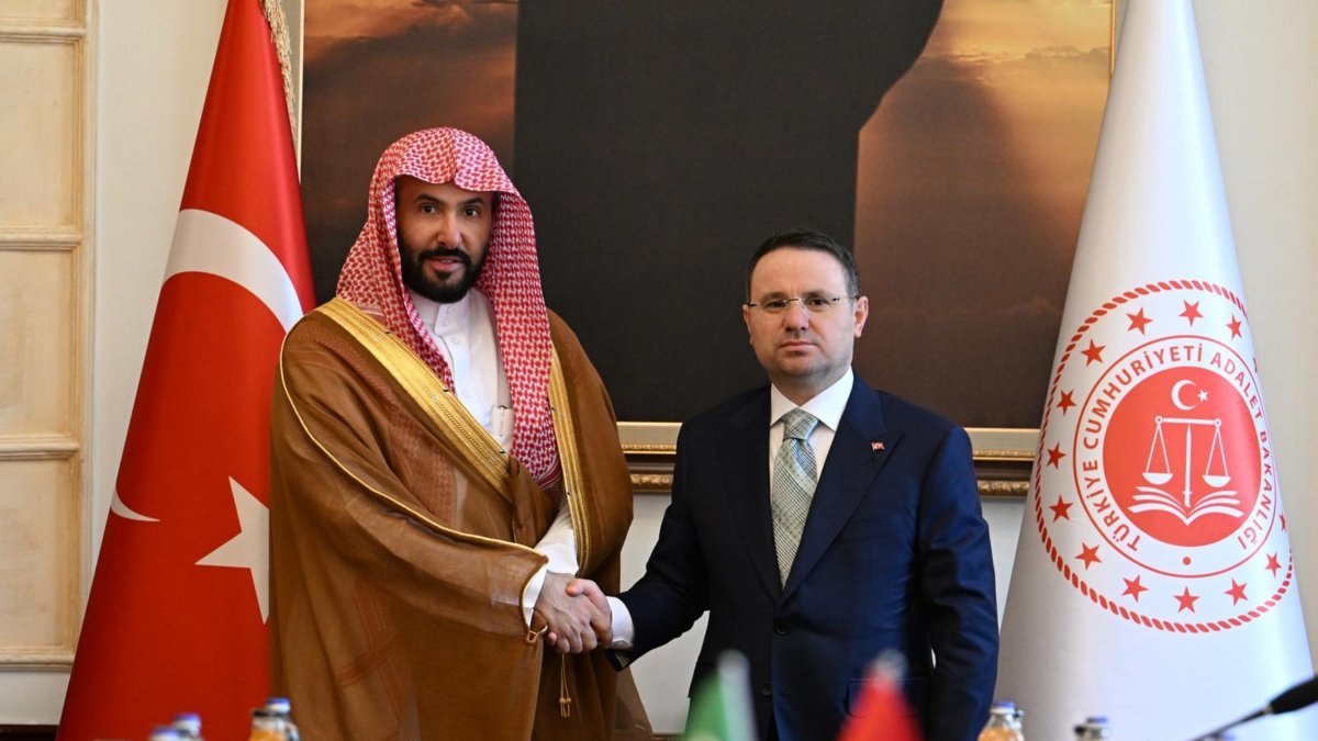 Turkish Justice Minister Akın Gürlek (R) shakes hands with Saudi Justice Minister Walid bin Muhammad Al Samaani, Ankara, Türkiye, July 22, 2026. (DHA Photo)