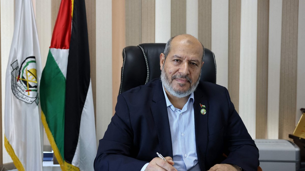 Khalil al-Hayya, senior leader and top Hamas legislative candidate, smiles during an interview with AFP at his office in Gaza City, April 21, 2021. (AFP File Photo)