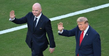 FIFA President Gianni Infantino (L) and U.S. President Donald Trump arrive for the final ceremony after the 2026 FIFA World Cup football tournament final match between Spain and Argentina at the New York/New Jersey Stadium, East Rutherford, U.S., July 19, 2026. (AFP Photo)