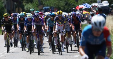 Lidl - Trek's Quinn Simmons in action with other cyclists during stage 17 of the Tour de France, Chambery to Voiron, Chambery, France, July 22, 2026. (Reuters Photo)