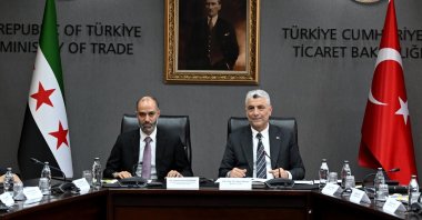 Trade Minister Ömer Bolat (R) during a meeting with Qutayba Badawi, head of the Syrian Customs and Border Crossings Authority, Ankara, Türkiye, July 22, 2026. (AA Photo)