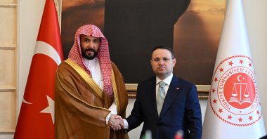 Turkish Justice Minister Akın Gürlek (R) shakes hands with Saudi Justice Minister Walid bin Muhammad Al Samaani, Ankara, Türkiye, July 22, 2026. (DHA Photo)
