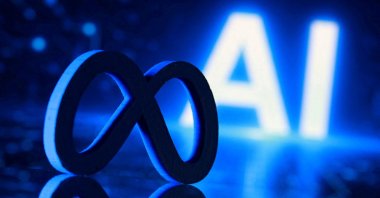 A 3D-printed Meta logo and the word "AI" are seen in this illustration created on July 20, 2026. (Reuters Photo)