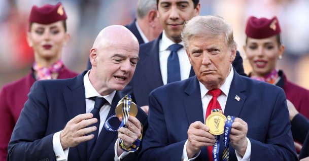 FIFA President Gianni Infantino (L) and U.S. President Donald Trump watch the medal at the award ceremony following the FIFA World Cup 2026 Final match between Spain and Argentina at New York New Jersey Stadium, East Rutherford, U.S., July 19, 2026. (AFP Photo)