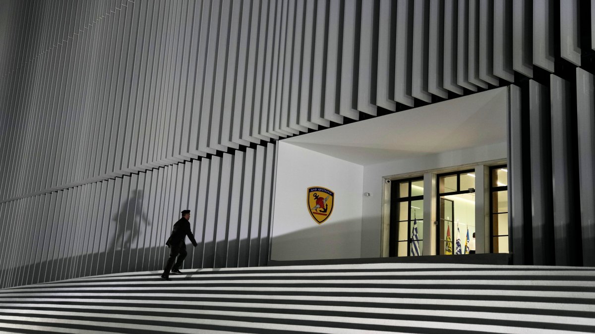 A military officer enters the Defense Ministry building, Athens, Greece, Oct. 29, 2025. (AP Photo)