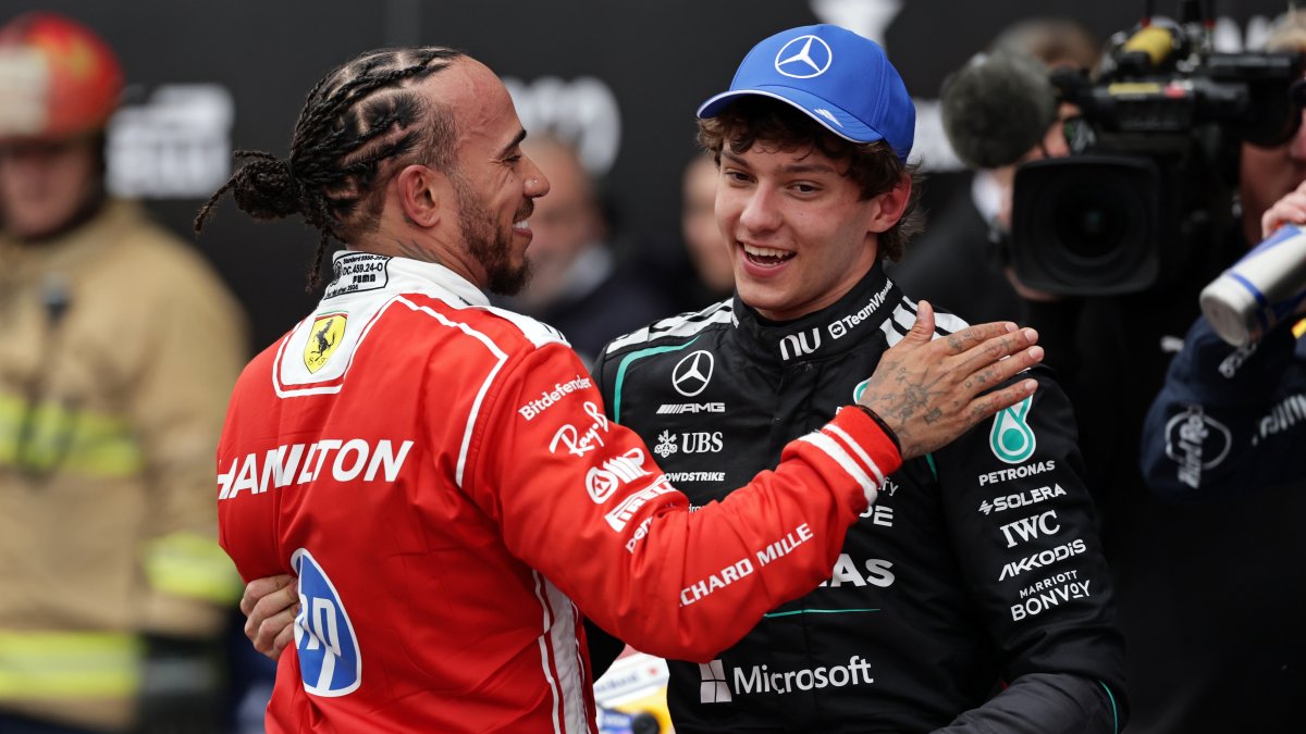 Mercedes' Kimi Antonelli's (R) is congratulated by Ferrari's Lewis Hamilton after winning the Canadian Grand Prix at the Circuit Gilles Villeneuve, Montreal, Canada, May 24, 2026. (AP Photo)