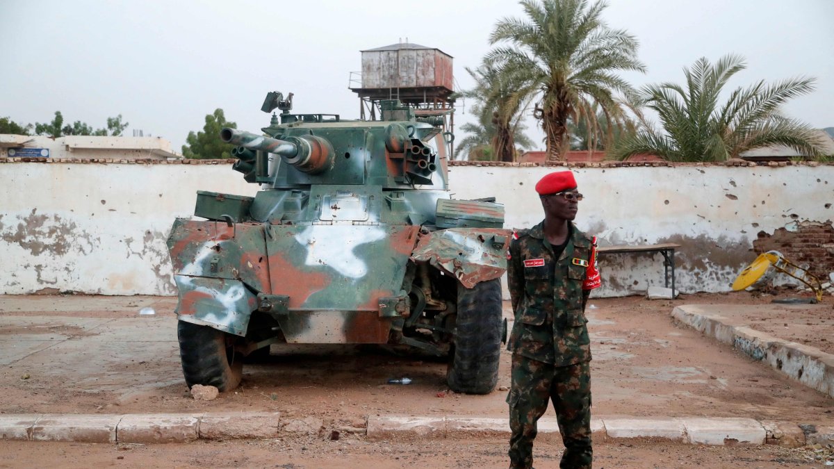 A Sudanese army soldier stands in front of a tank on display at the War Museum, Khartoum North (Bahri), Sudan, July 2, 2026. (AFP Photo)