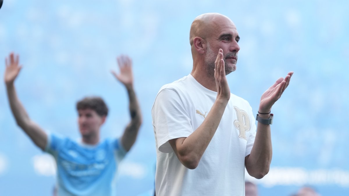Manchester City's head coach Pep Guardiola applauds the fans after his last game with the club after a Premier League match between Manchester City and Aston Villa, Manchester, U.K., May 24, 2026. (AP Photo)