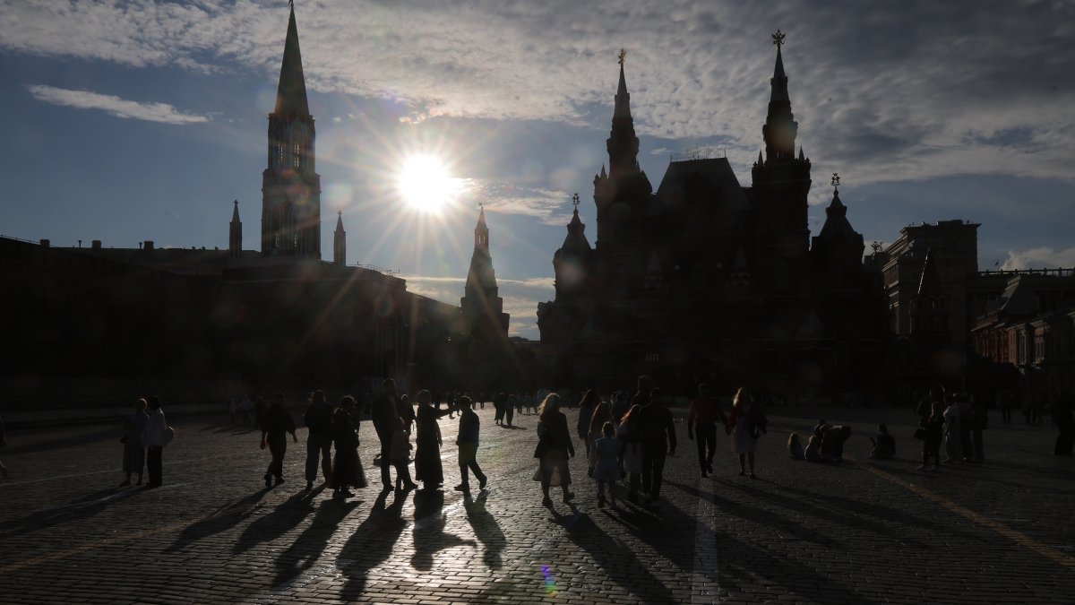 People walk on the Red Square outside the Kremlin on a summer day in downtown Moscow, Russia, June 26, 2026. (EPA Photo)