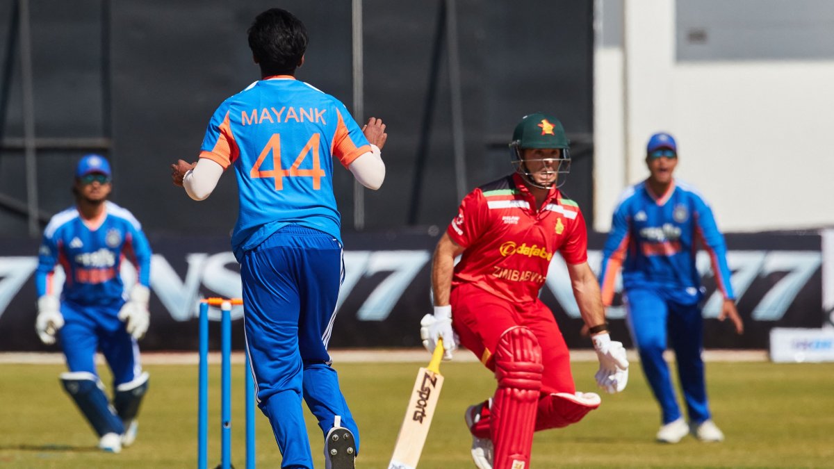 Zimbabwe's Ryan Burl (2nd R) runs between the wickets during the first Twenty20 international cricket match between Zimbabwe and India at Harare Sports Club, Harare, Zimbabwe, July 23, 2026. (AFP Photo)