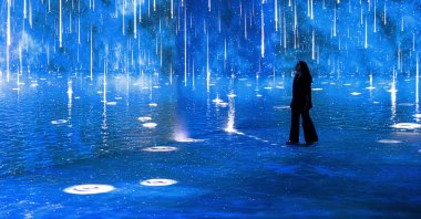 A visitor explores the "Timewalk Exhibition," London, U.K., July 21, 2026. (Photo by Funda Karayel)