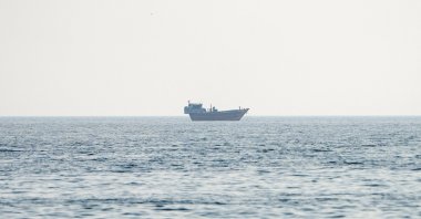 A vessel at the Strait of Hormuz, as seen from Musandam, Oman, July 23, 2026. (Reuters Photo)