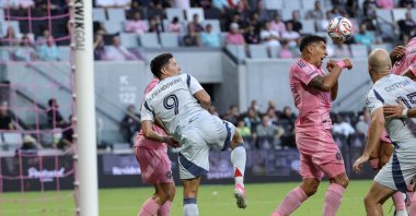 Chicago Fire's Robert Lewandowski (L) in action against Inter Miami CF's Luis Suarez (C) during the MLS game at Nu Stadium, Miami, U.S., July 22, 2026. (EPA Photo)