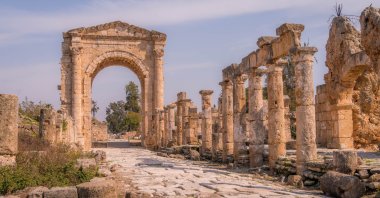 An undated view of the Tyre necropolis triumphal arch and the road with columns, at a UNESCO archeological historic site, Sour, Lebanon. (Shutterstock Photo)