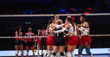 Türkiye's women's volleyball team players celebrate during the 2026 FIVB Volleyball Nations League (VNL) quarterfinals match against Canada at the East Asian Games Dome, Macau, China, July 23, 2026. (AA Photo)