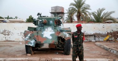 A Sudanese army soldier stands in front of a tank on display at the War Museum, Khartoum North (Bahri), Sudan, July 2, 2026. (AFP Photo)