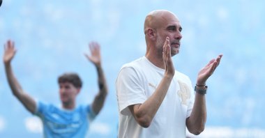 Manchester City's head coach Pep Guardiola applauds the fans after his last game with the club after a Premier League match between Manchester City and Aston Villa, Manchester, U.K., May 24, 2026. (AP Photo)