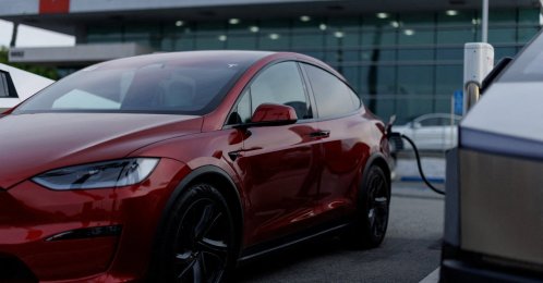 A Tesla model Y is shown charging at a Tesla dealership in Buena Park, California, U.S., Jan. 28, 2026. (Reuters Photo)