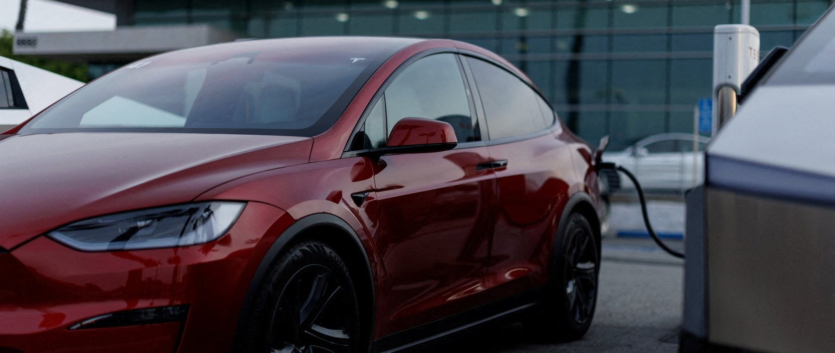 A Tesla model Y is shown charging at a Tesla dealership in Buena Park, California, U.S., Jan. 28, 2026. (Reuters Photo)