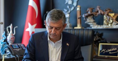Former Republican People's Party (CHP) leader Özgür Özel signs the founding documents of his new political party in Ankara, Türkiye, July 24, 2026. (IHA Photo) 