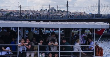 People are seen on a ferry, Istanbul, Türkiye, July 23, 2026. (AA Photo)