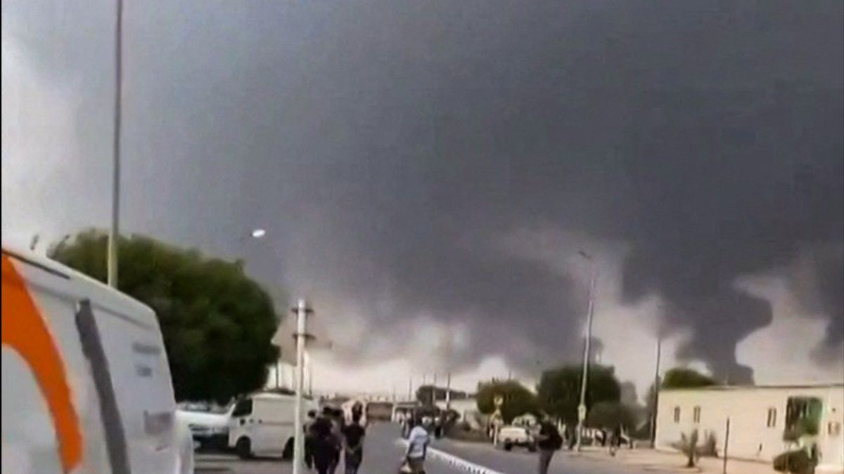 This screen grab taken on July 25, 2026 from an undated UGC video footage posted on social media and verified by AFPTV teams shows clouds of smoke rising after strikes on the Saudi Aramco refinery in Jizan. (AFP Photo)