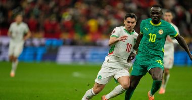 Morocco's Brahim Diaz (L) and Senegal's Sadio Mane fight for the ball during the Africa Cup of Nations final match, Rabat, Morocco, Jan. 18, 2026. (AP Photo)