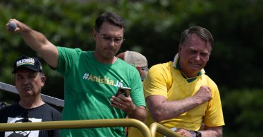 Brazil's former president Jair Bolsonaro (R) and his son Senator Flavio Bolsonaro take part in a rally in Copacabana, Rio de Janeiro, Brazil, March 16, 2025. (AFP Photo)