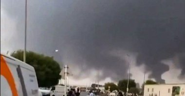 This screen grab taken on July 25, 2026 from an undated UGC video footage posted on social media and verified by AFPTV teams shows clouds of smoke rising after strikes on the Saudi Aramco refinery in Jizan. (AFP Photo)