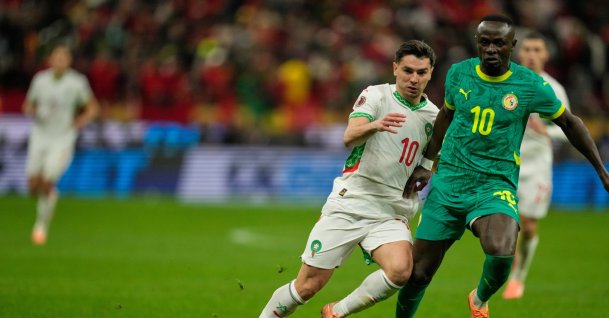 Morocco's Brahim Diaz (L) and Senegal's Sadio Mane fight for the ball during the Africa Cup of Nations final match, Rabat, Morocco, Jan. 18, 2026. (AP Photo)