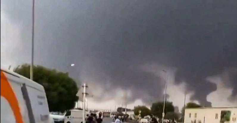 This screen grab taken on July 25, 2026 from an undated UGC video footage posted on social media and verified by AFPTV teams shows clouds of smoke rising after strikes on the Saudi Aramco refinery in Jizan. (AFP Photo)
