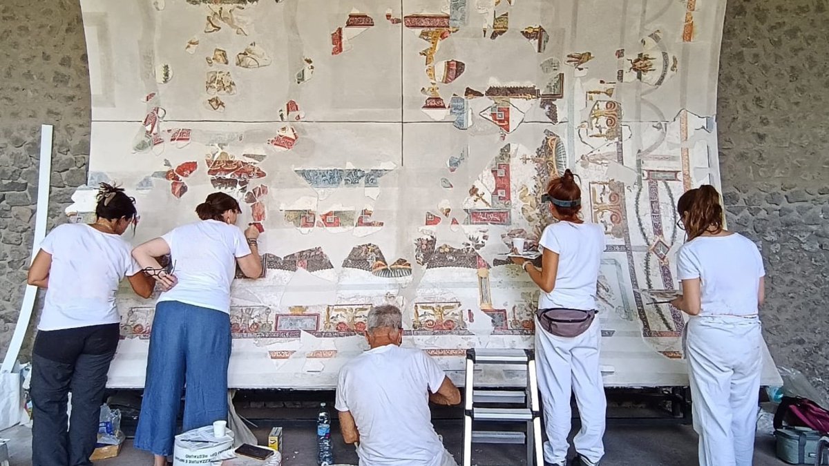 In this picture made available by the Archaeological Park of Pompeii, part of the restored ceiling of the Bakery House is displayed at the Pompeii Archaeological site, Italy, July 24, 2026. (AP Photo)