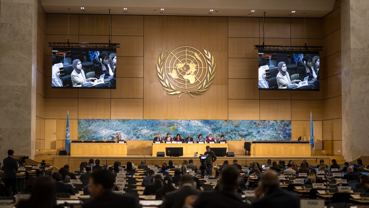 A representative of Qatar is seen on screens as he delivers a speech on human rights in the Islamic Republic of Iran during a session of the U.N. Human Rights Council, in Geneva, March 16, 2026. (AFP File Photo)