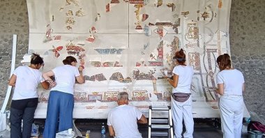 In this picture made available by the Archaeological Park of Pompeii, part of the restored ceiling of the Bakery House is displayed at the Pompeii Archaeological site, Italy, July 24, 2026. (AP Photo)