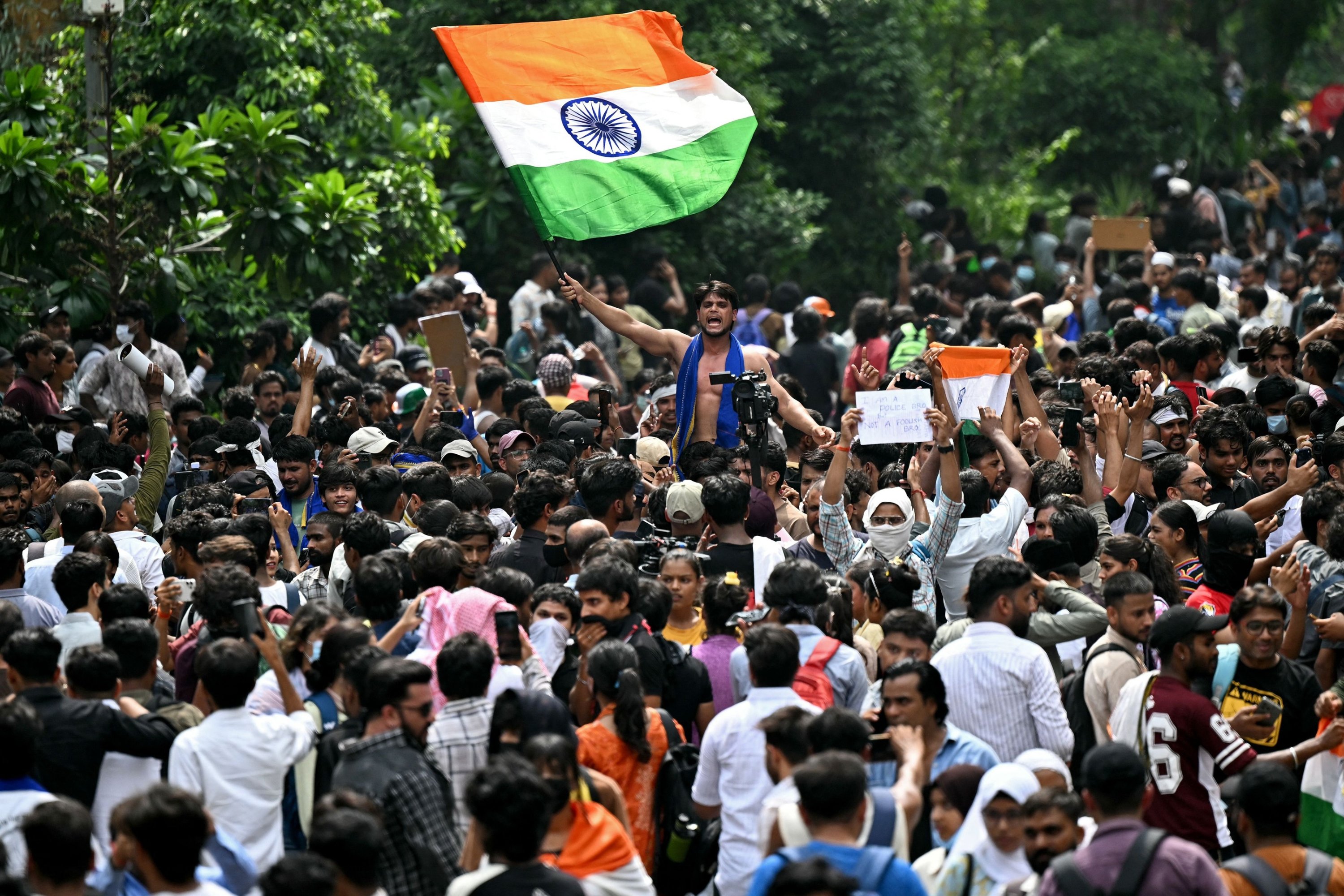 Cockroach Janta Party (CJP) supporters celebrate the resignation of India's Education Minister Dharmendra Pradhan at Jantar Mantar in New Delhi, India, July 25, 2026. (AFP Photo)