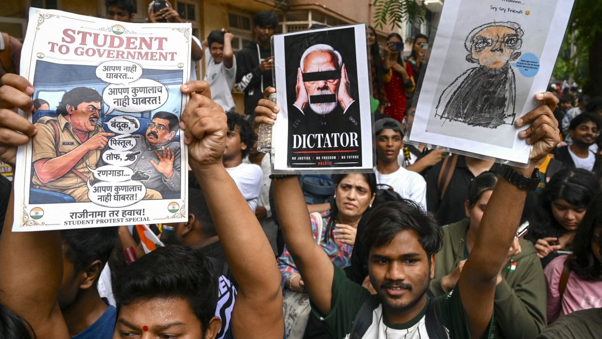 Demonstrators holding posters take part in a protest rally in Mumbai, India, July 24, 2026. (AFP Photo)