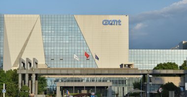 People walk past the headquarters of ChangXin Memory Technologies (CXMT), Hefei, China’s eastern Anhui province, July 16, 2026. (AFP Photo)
