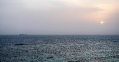 A vessel transits the Bab el-Mandeb Strait off the coast of southern Yemen, July 25, 2026. (AFP Photo)