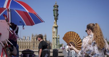 Visitors walk on the Southbank during the hottest day in June recorded, London, England, U.K., June 24, 2026. (Getty Images Photo)