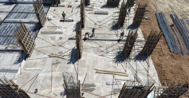 Workers are seen at a construction site, Elazığ, Türkiye, 29 July, 2026. (IHA Photo)