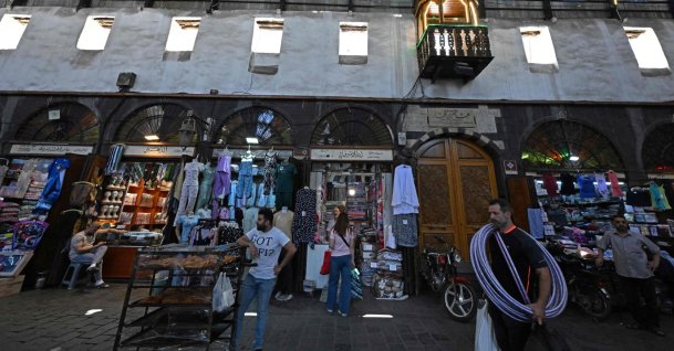 Shopkeepers wait for customers in an old market near the Umayyad Mosque, Damascus, Syria, July 9, 2026. (AFP Photo)