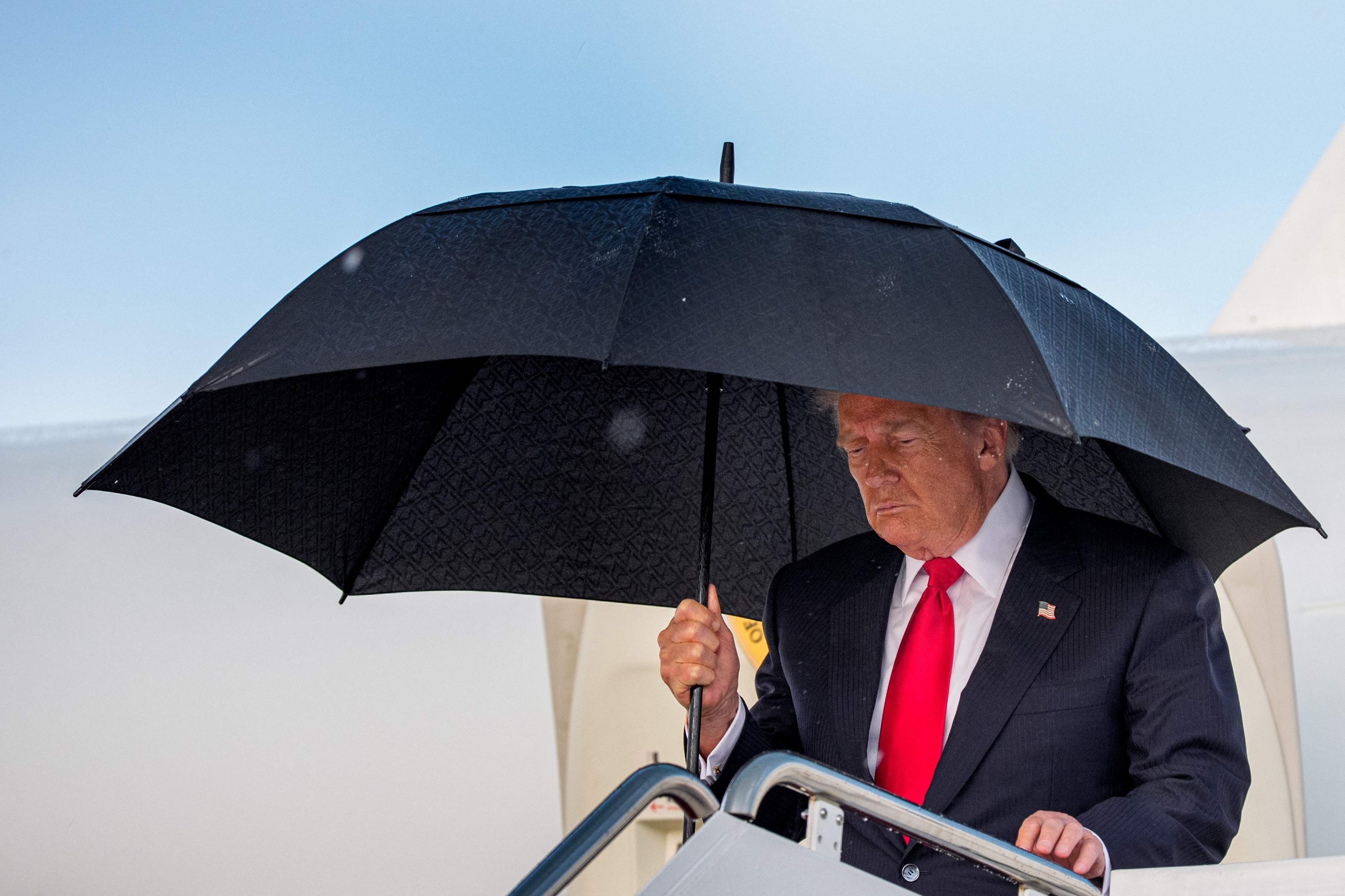 Trump claims ‘good’ talks but reiterates threat to hit Iran